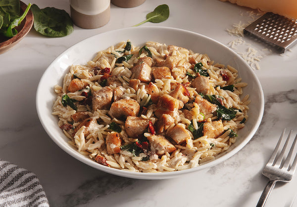 Creamy Parmesan Chicken Orzo with Spinach and Sun Dried Tomatoes