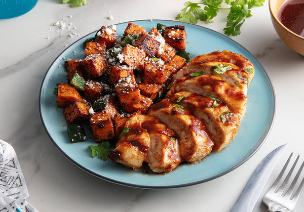 Ancho Chile Glazed Chicken with Roasted Sweet Potatoes, Poblanos and Cotija