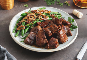 Honey Bourbon Steak Tips with Green Beans and Caramelized Onions