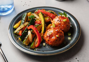 Sticky Ginger Sesame Meatballs with Garlic Zucchini and Peppers