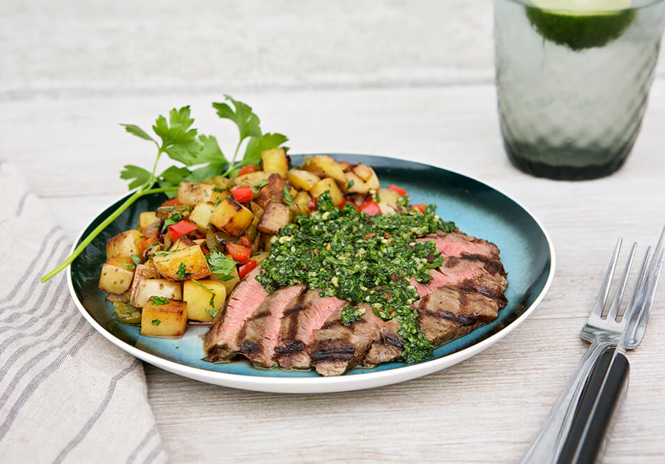 Chimichurri Grass-Fed Flank Steak with Oven Home Fries, Peppers and Onions