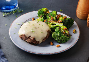 Grass-Fed Beef Burger with Fontina Cheese and Garlic Roasted Pistachio Broccoli