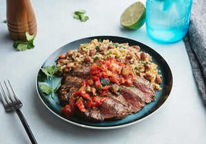 Grass-Fed Flank Steak with Roasted Chili Salsa and Cauliflower Rice and Beans