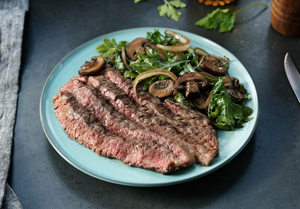 Grilled Grass-Fed Flank Steak with Balsamic Glazed Mushrooms and Kale