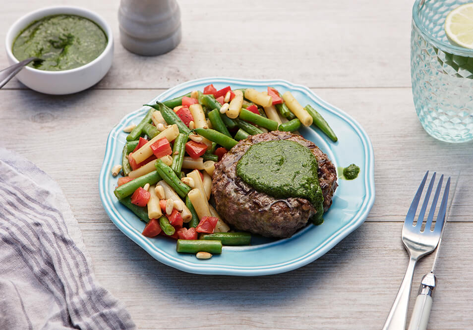 Grilled Grass-Fed Beef Burger with Salsa Verde, Mixed Beans, Tomatoes and Pine Nuts