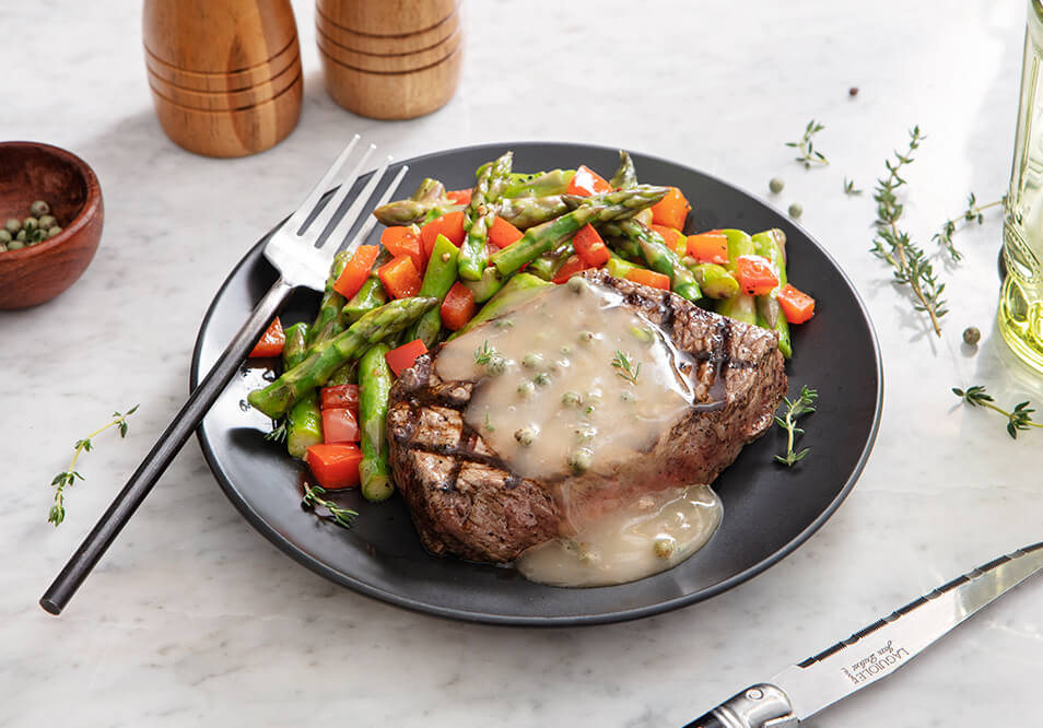 Grilled Grass-Fed Top Steak with Peppercorn Sauce, Asparagus and Roasted Red Peppers