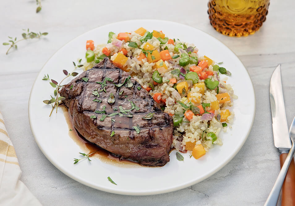 Grilled Grass-Fed Top Steak with Riced Cauliflower Pilaf