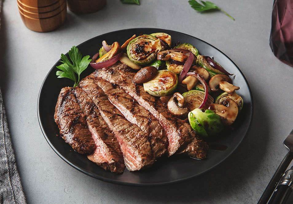 Honey-Roasted Grass-Fed Flank Steak with Balsamic Glazed Brussels Sprouts and Mushrooms