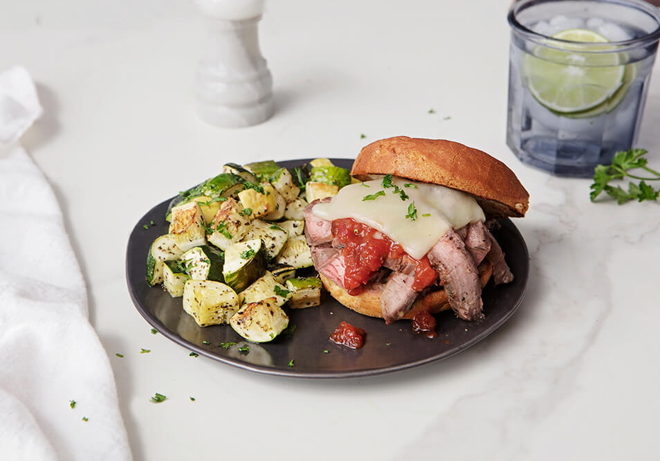 Italian Grass-Fed Steak Sandwich with Tomato Relish and Sauteed Zucchini