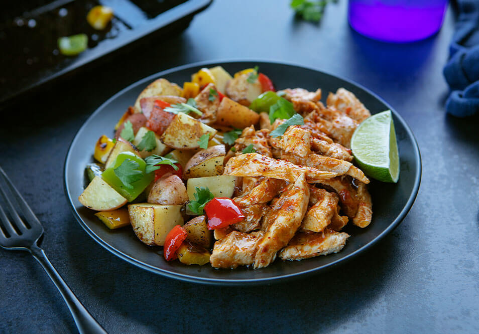 Sweet Mango-Lime Shredded Turkey with Jamaican Jerk Roasted Potatoes and Peppers