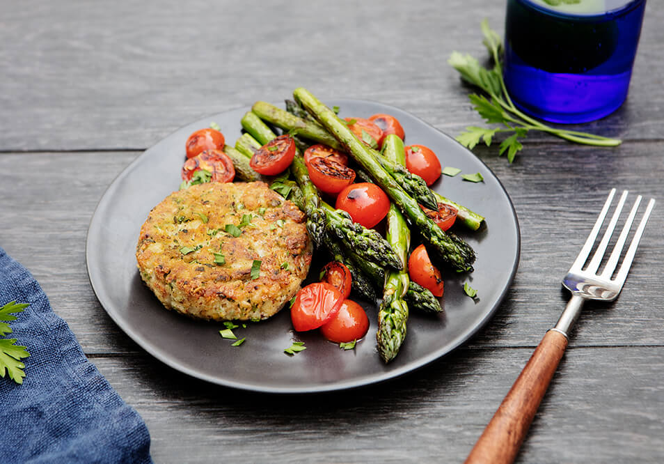 New England Wild-Caught Cod Cake with Roasted Asparagus and Tomatoes