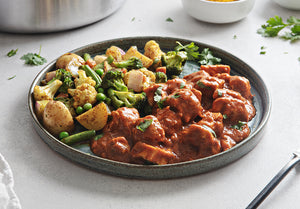 Indian-Style Butter Chicken with Curry Roasted Vegetables