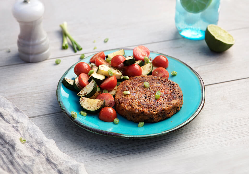 Ultimate Quinoa and Black Bean Burger with Sauteed Zucchini and Tomatoes