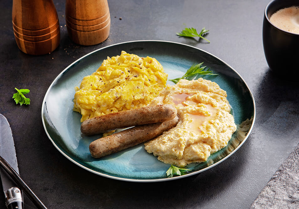 Scrambled Free-Range Eggs with Maple Grits and Sage Chicken Sausage