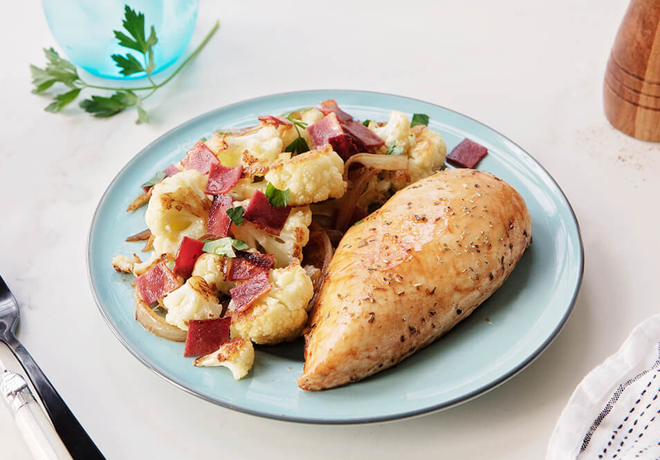 Smoked Chicken Breast with Roasted Cauliflower, Turkey Bacon and Caramelized Onions