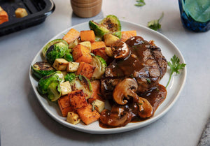 Grilled Grass-Fed Top Steak with Mushroom Sauce and Honey Mustard Vegetable Medley