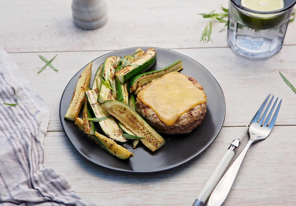 Grilled Organic Free-Range Turkey Burger with Gouda Cheese and Zucchini Spears