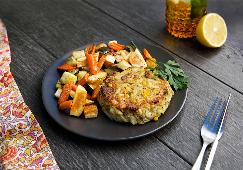 Wild-Caught Cod and Corn Cakes with Roasted Root Vegetables