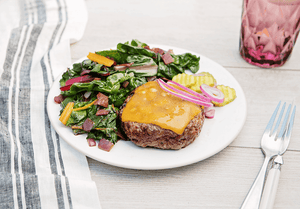 Grass-Fed Cheddar Burger and Braised Greens with Bacon